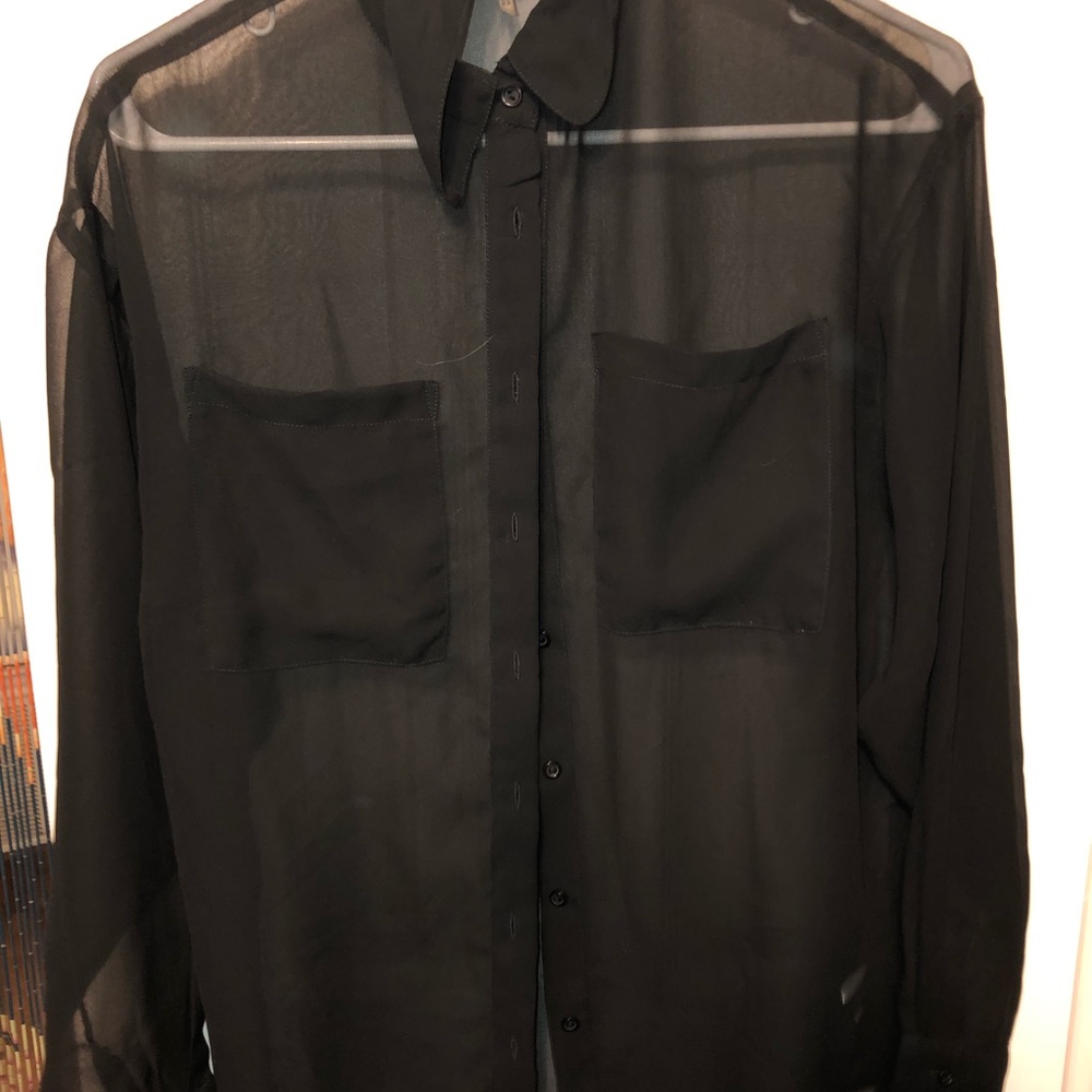 Sheer black long sleeved blouse